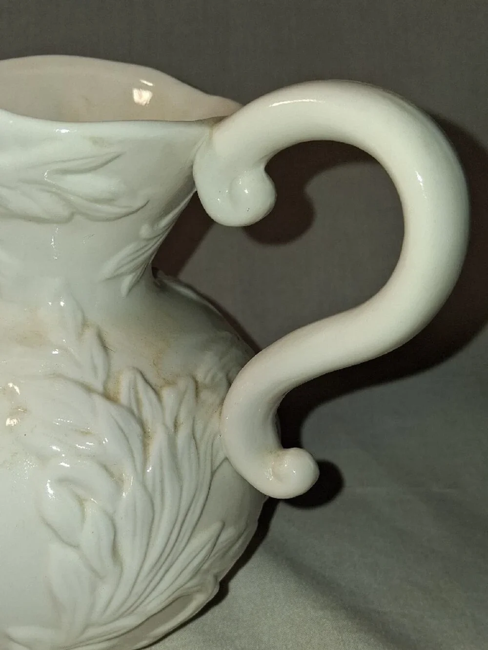 Vintage White Embossed Pitcher with Leaves/Vines Design Curved Handle